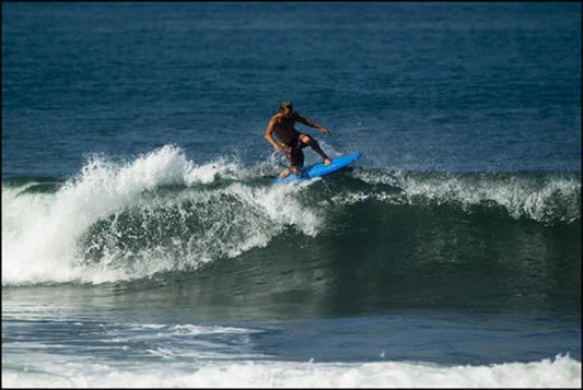 Asher Pacey aboard his 'Deus Customs' single fin